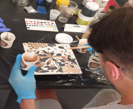 Create a collage with epoxy resin and non-standard elements - coins, nuts, paper clips - 40х40 panel