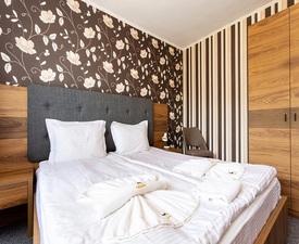 Нощувка за двама + 2 деца на брега на яз. Доспат