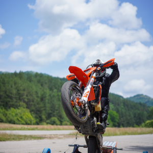 A lesson on riding on an enduro motorcycle on a single tire A lesson on riding on an enduro motorcycle on a single tire