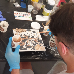 Create a collage with epoxy resin and non-standard elements - coins, nuts, paper clips Create a collage with epoxy resin and non-standard elements - coins, nuts, paper clips