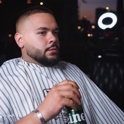 A haircut and a glass of whiskey with a Studio Blades Men's Grooming Package A haircut and a glass of whiskey with a Studio Blades Men's Grooming Package