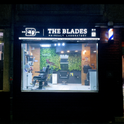 A haircut and a glass of whiskey with a Studio Blades Men's Grooming Package A haircut and a glass of whiskey with a Studio Blades Men's Grooming Package